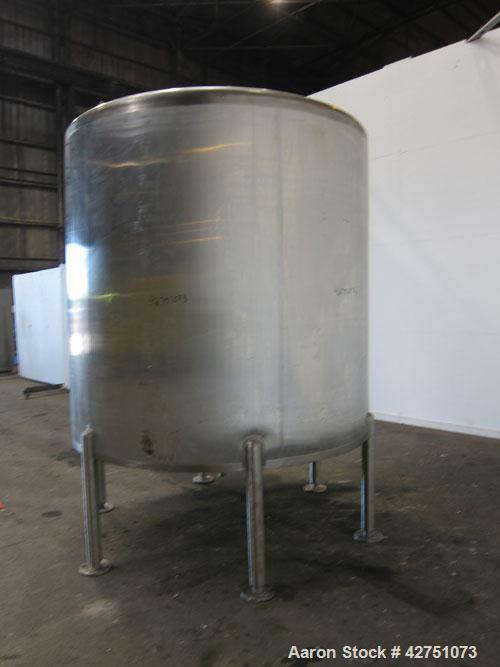 Used Cherry-Burrell Tank, 2000 Gallon, 316 Stainless Steel, Vertical. 84" Diameter x 84" straight side. Dished top, coned bottom. Openings top 1-1/2" tri-clamp, 3", (2) 2" NPT, 6", 18" man way with c...