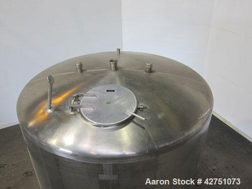 Used Cherry-Burrell Tank, 2000 Gallon, 316 Stainless Steel, Vertical. 84" Diameter x 84" straight side. Dished top, coned bottom. Openings top 1-1/2" tri-clamp, 3", (2) 2" NPT, 6", 18" man way with c...