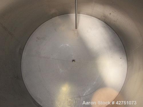 Used Cherry-Burrell Tank, 2000 Gallon, 316 Stainless Steel, Vertical. 84" Diameter x 84" straight side. Dished top, coned bottom. Openings top 1-1/2" tri-clamp, 3", (2) 2" NPT, 6", 18" man way with c...