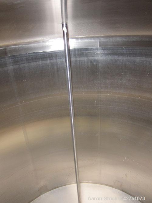 Used Cherry-Burrell Tank, 2000 Gallon, 316 Stainless Steel, Vertical. 84" Diameter x 84" straight side. Dished top, coned bottom. Openings top 1-1/2" tri-clamp, 3", (2) 2" NPT, 6", 18" man way with c...