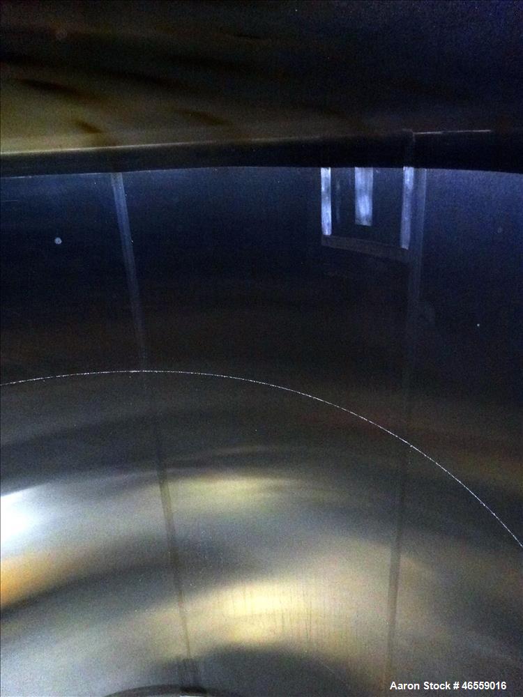 Used Cherry Burrell Tank, 4,500 Gallon, 316 Stainless Steel, Vertical. Approximate 104" diameter x 120" straight side. Single Shell, dished top and bottom. Openings top: 18" manway with cover, (1) 4"...