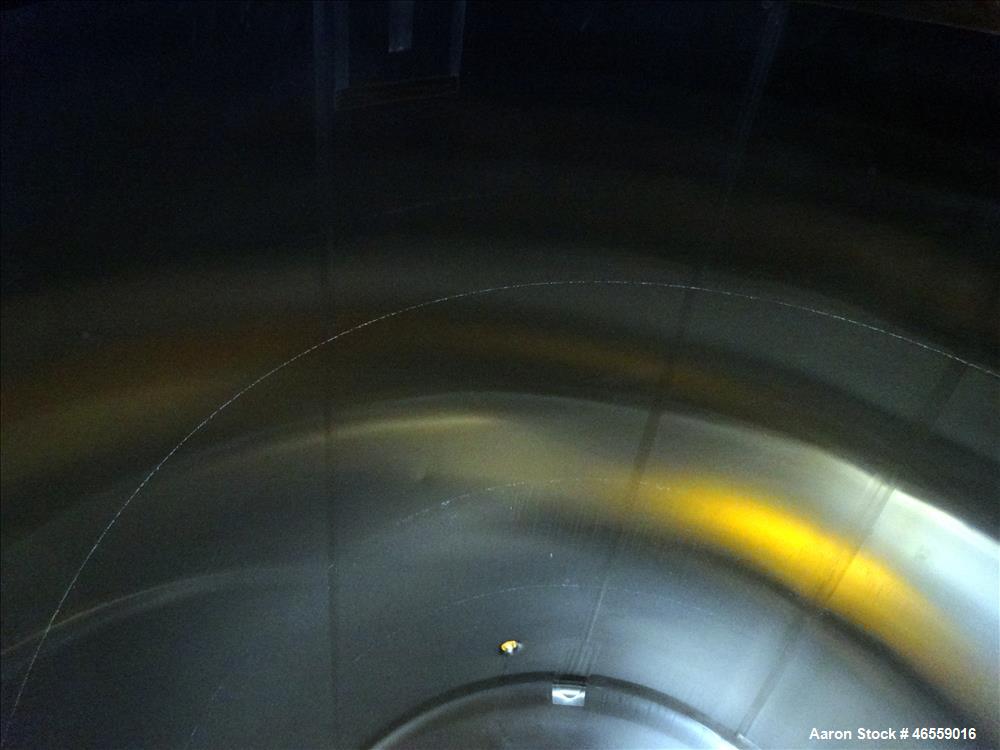 Used Cherry Burrell Tank, 4,500 Gallon, 316 Stainless Steel, Vertical. Approximate 104" diameter x 120" straight side. Single Shell, dished top and bottom. Openings top: 18" manway with cover, (1) 4"...