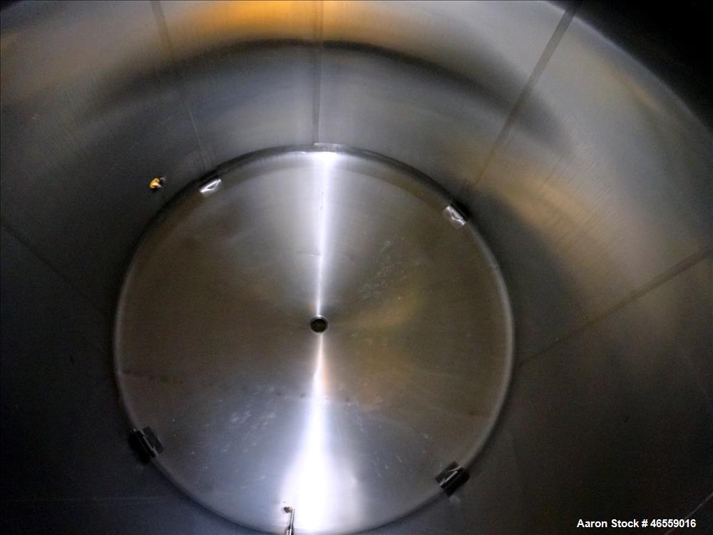 Used Cherry Burrell Tank, 4,500 Gallon, 316 Stainless Steel, Vertical. Approximate 104" diameter x 120" straight side. Single Shell, dished top and bottom. Openings top: 18" manway with cover, (1) 4"...