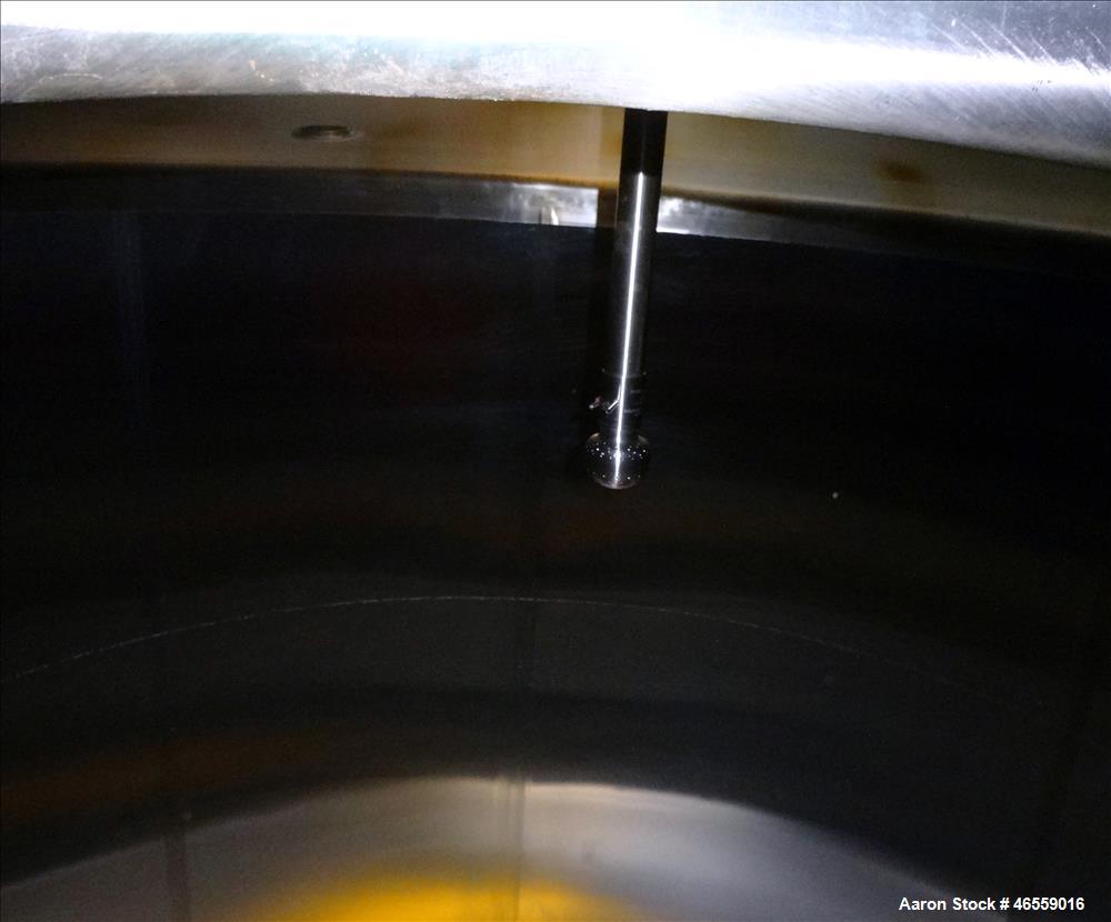 Used Cherry Burrell Tank, 4,500 Gallon, 316 Stainless Steel, Vertical. Approximate 104" diameter x 120" straight side. Single Shell, dished top and bottom. Openings top: 18" manway with cover, (1) 4"...