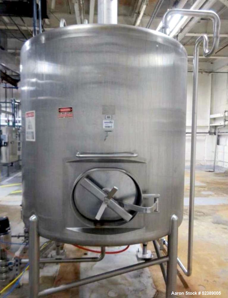 Used Cherry Burrell 1,000 Gallon Stainless Steel Tank, Vertical. Approximate 60" diameter x 76" straight side. Dished top and bottom. Openings top: (1) 2-1/2" sanitary thread reduced to 1-1/2" tri-cl...