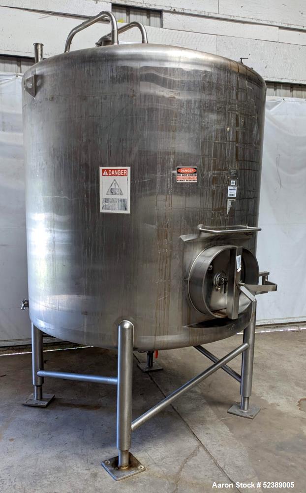 Used Cherry Burrell 1,000 Gallon Stainless Steel Tank, Vertical. Approximate 60" diameter x 76" straight side. Dished top and bottom. Openings top: (1) 2-1/2" sanitary thread reduced to 1-1/2" tri-cl...