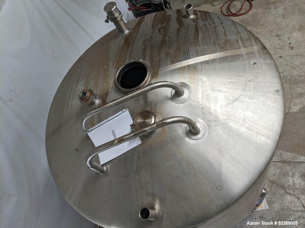 Used Cherry Burrell 1,000 Gallon Stainless Steel Tank, Vertical. Approximate 60" diameter x 76" straight side. Dished top and bottom. Openings top: (1) 2-1/2" sanitary thread reduced to 1-1/2" tri-cl...