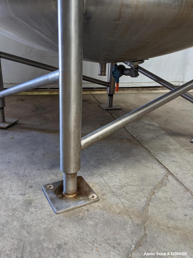Used Cherry Burrell 1,000 Gallon Stainless Steel Tank, Vertical. Approximate 60" diameter x 76" straight side. Dished top and bottom. Openings top: (1) 2-1/2" sanitary thread reduced to 1-1/2" tri-cl...