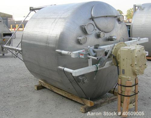 Used Creamery Package Tank, 1000 gallon, 304 stainless steel, vertical. 72" diameter x 53" straight side. Dished top, coned bottom. Fixed carbon steel agitator bridge, bottom supported anchor agitato...
