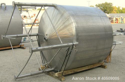 Used Creamery Package Tank, 1000 gallon, 304 stainless steel, vertical. 72" diameter x 53" straight side. Dished top, coned bottom. Fixed carbon steel agitator bridge, bottom supported anchor agitato...