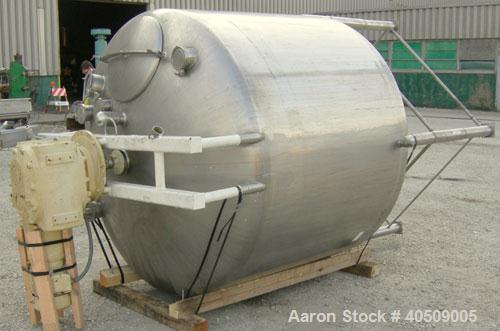 Used Creamery Package Tank, 1000 gallon, 304 stainless steel, vertical. 72" diameter x 53" straight side. Dished top, coned bottom. Fixed carbon steel agitator bridge, bottom supported anchor agitato...