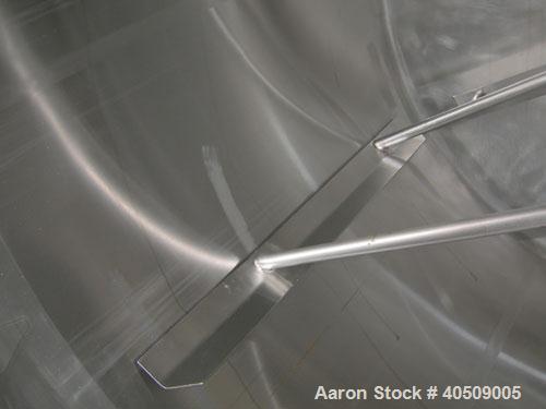 Used Creamery Package Tank, 1000 gallon, 304 stainless steel, vertical. 72" diameter x 53" straight side. Dished top, coned bottom. Fixed carbon steel agitator bridge, bottom supported anchor agitato...