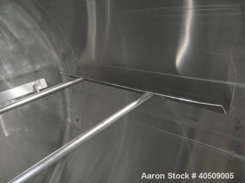 Used Creamery Package Tank, 1000 gallon, 304 stainless steel, vertical. 72" diameter x 53" straight side. Dished top, coned bottom. Fixed carbon steel agitator bridge, bottom supported anchor agitato...