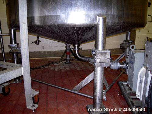 Used Creamery Package Tank, 1000 Gallon, stainless steel, vertical. 72" diameter x 54" straight side. Dished top, coned bottom. Fixed carbon steel agitator bridge, bottom supported anchor agitator wi...