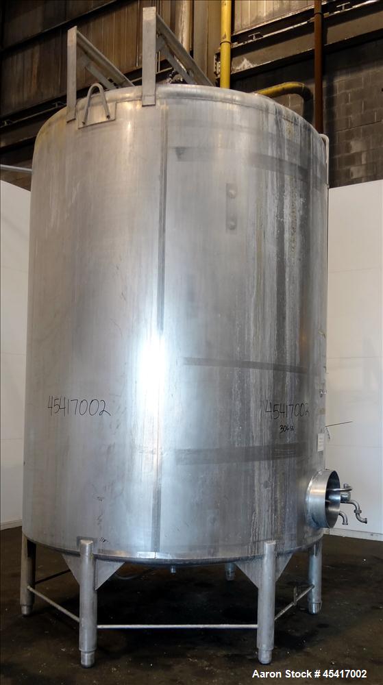 Used Crepaco Tank, 3500 Gallons, 304 Stainless Steel, Vertical. Approximate 96" Diameter x 118" Straight Side. Dish top (dented), coned bottom. Fixed stainless steel agitator bridge, (1) baffle, (1) ...