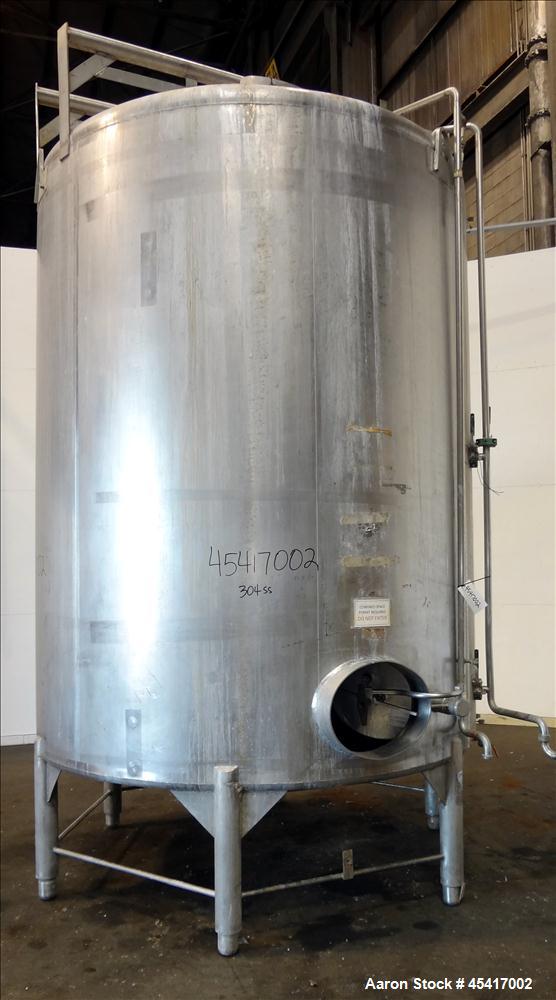 Used Crepaco Tank, 3500 Gallons, 304 Stainless Steel, Vertical. Approximate 96" Diameter x 118" Straight Side. Dish top (dented), coned bottom. Fixed stainless steel agitator bridge, (1) baffle, (1) ...