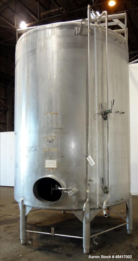 Used Crepaco Tank, 3500 Gallons, 304 Stainless Steel, Vertical. Approximate 96" Diameter x 118" Straight Side. Dish top (dented), coned bottom. Fixed stainless steel agitator bridge, (1) baffle, (1) ...