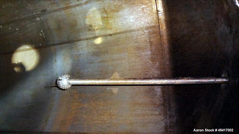 Used Crepaco Tank, 3500 Gallons, 304 Stainless Steel, Vertical. Approximate 96" Diameter x 118" Straight Side. Dish top (dented), coned bottom. Fixed stainless steel agitator bridge, (1) baffle, (1) ...