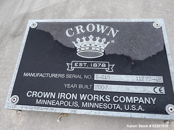 Unused- Crown Iron Works Inc. approximately 1300 gallon 304 stainless steel vertical tank. 60" diameter X 96" high straight ...