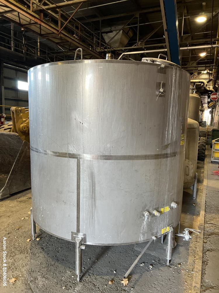 Used Industries D'Acler Tank, Approximate 6625 Liter (1750 Gallon), 304 Stainless Steel, Vertical. Approximate 78" diameter x 72" straight side, coned top & bottom. Mounted on 4 stainless legs. Seria...