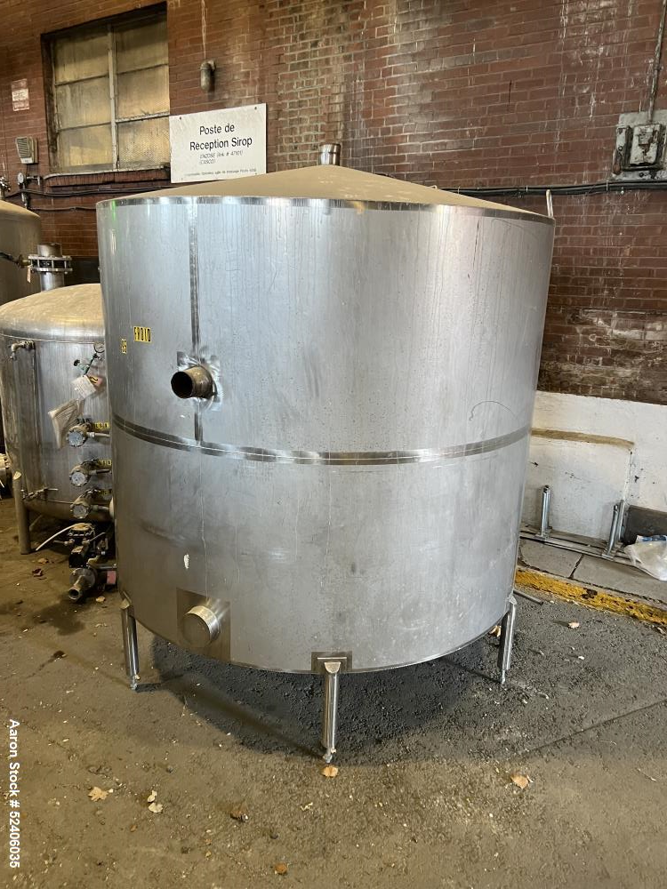 Used Industries D'Acler Tank, Approximate 6625 Liter (1750 Gallon), 304 Stainless Steel, Vertical. Approximate 78" diameter x 72" straight side, coned top & bottom. Mounted on 4 stainless legs. Seria...