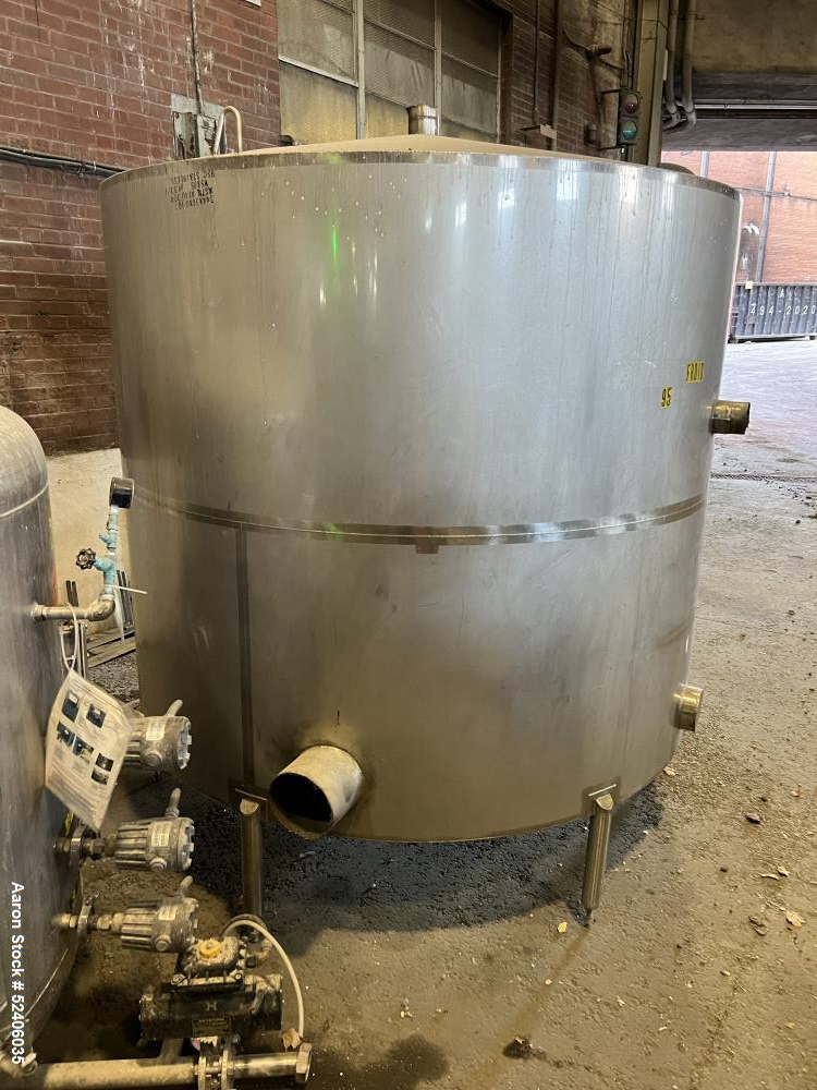 Used Industries D'Acler Tank, Approximate 6625 Liter (1750 Gallon), 304 Stainless Steel, Vertical. Approximate 78" diameter x 72" straight side, coned top & bottom. Mounted on 4 stainless legs. Seria...