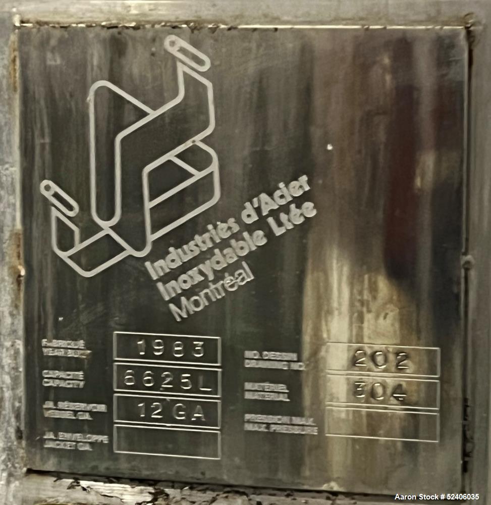 Used Industries D'Acler Tank, Approximate 6625 Liter (1750 Gallon), 304 Stainless Steel, Vertical. Approximate 78" diameter x 72" straight side, coned top & bottom. Mounted on 4 stainless legs. Seria...