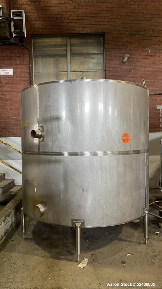 Used Industries D'Acler Tank, Approximate 6625 Liter (1750 Gallon), 304 Stainless Steel, Vertical. Approximate 78" diameter x 72" straight side, coned top & bottom. Mounted on 4 stainless legs. Seria...
