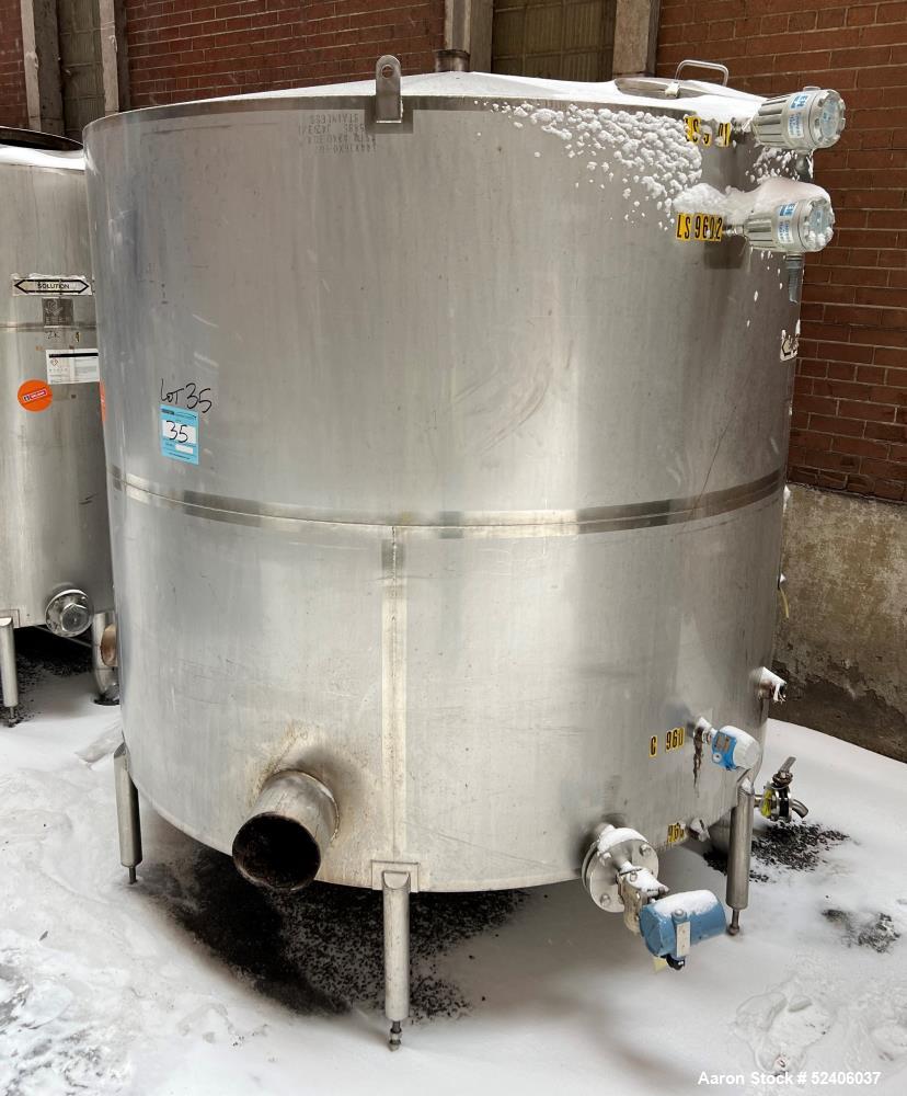 Used Industries D'Acler Tank, Approximate 6625 Liter (1750 Gallon), 304 Stainless Steel, Vertical. Approximate 78" diameter x 72" straight side, coned top & bottom. Mounted on 4 stainless legs. Seria...