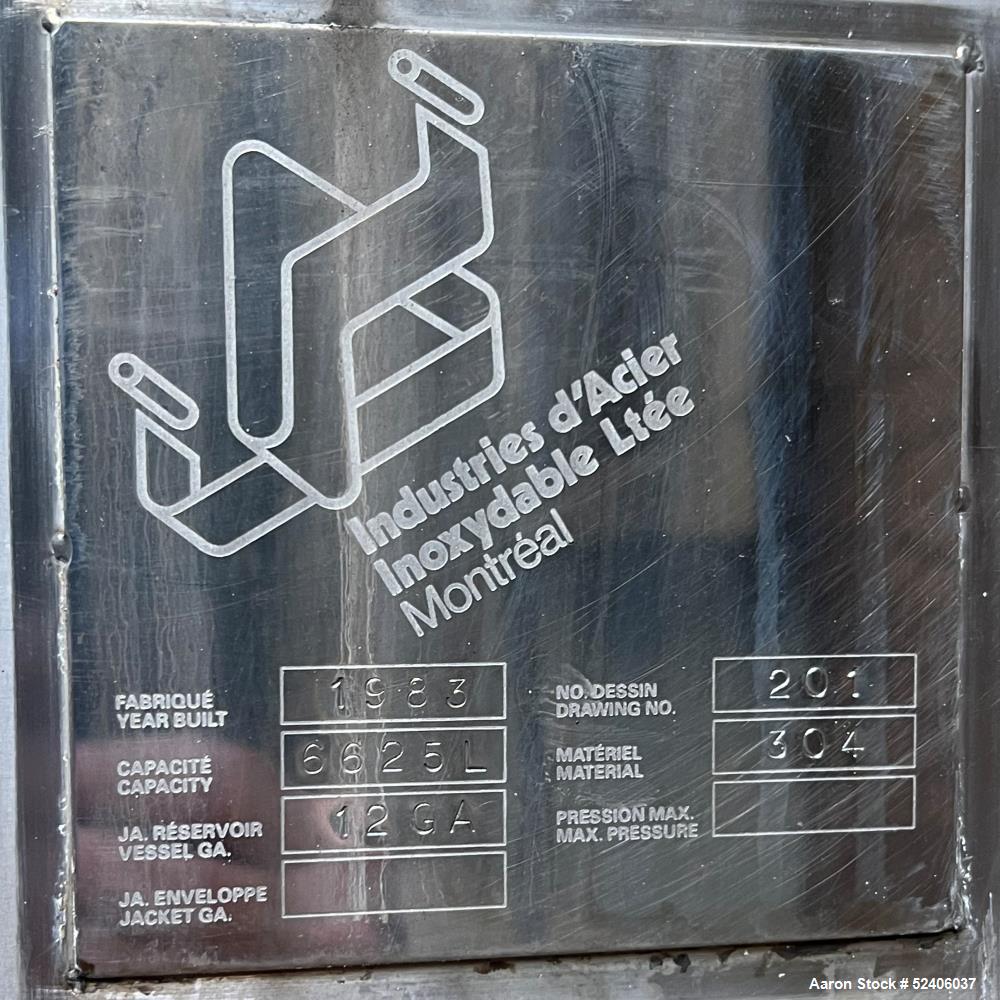 Used Industries D'Acler Tank, Approximate 6625 Liter (1750 Gallon), 304 Stainless Steel, Vertical. Approximate 78" diameter x 72" straight side, coned top & bottom. Mounted on 4 stainless legs. Seria...