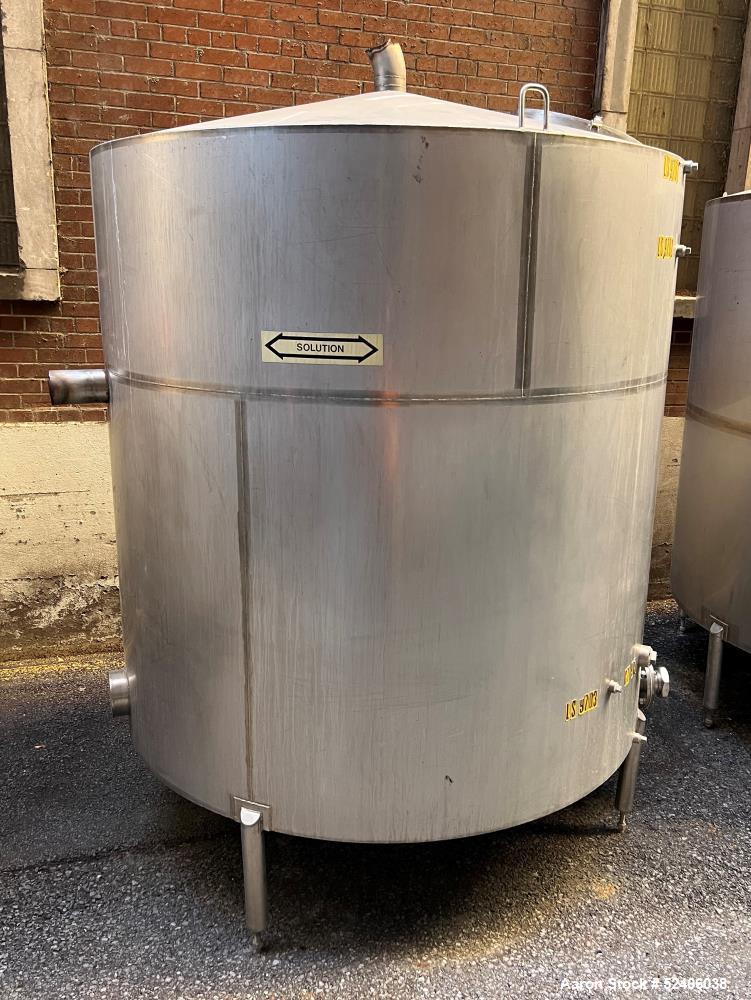 Used Industries D'Acler Tank, Approximate 4730 Liter (1249 Gallon), 316 Stainless Steel, Vertical. Approximate 72" diameter x 72" straight side, coned top & bottom. Mounted on 4 stainless legs. Seria...