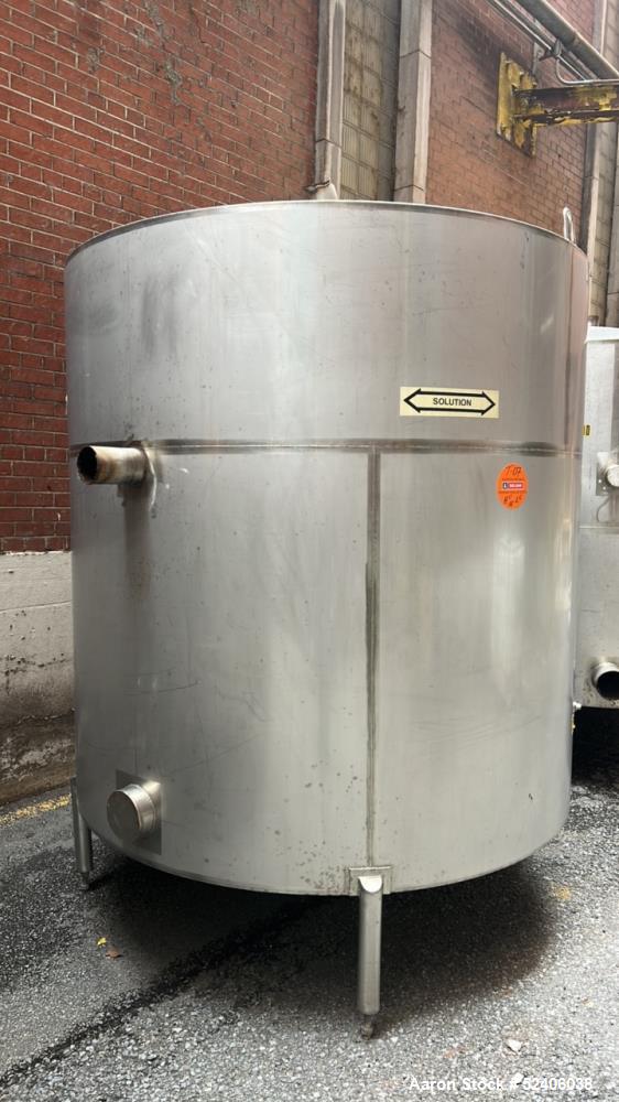 Used Industries D'Acler Tank, Approximate 4730 Liter (1249 Gallon), 316 Stainless Steel, Vertical. Approximate 72" diameter x 72" straight side, coned top & bottom. Mounted on 4 stainless legs. Seria...