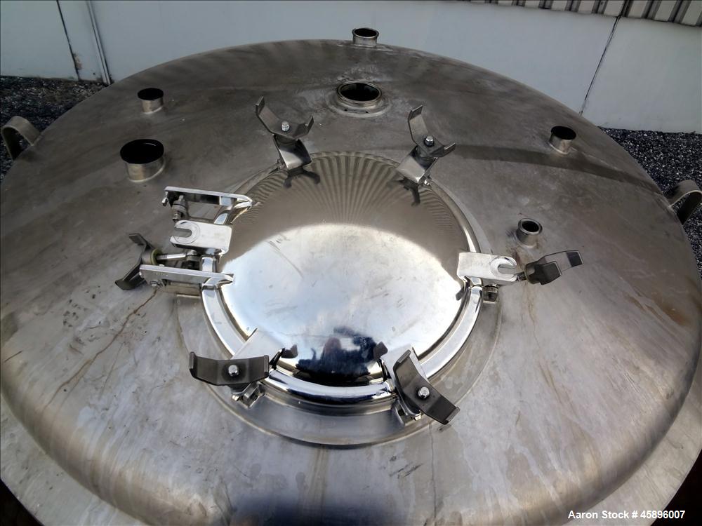 Used DCI Pressure Tank, 1000 Gallon, 316L Stainless Steel, Vertical. 76" Diameter x 52" straight side, dished top and bottom. 180 Grit finished internal rated 30/-15 psi at -20 to 300 degrees F. Insu...