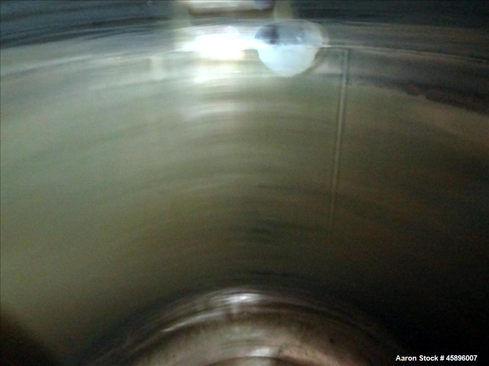 Used DCI Pressure Tank, 1000 Gallon, 316L Stainless Steel, Vertical. 76" Diameter x 52" straight side, dished top and bottom. 180 Grit finished internal rated 30/-15 psi at -20 to 300 degrees F. Insu...