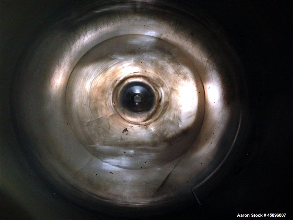Used DCI Pressure Tank, 1000 Gallon, 316L Stainless Steel, Vertical. 76" Diameter x 52" straight side, dished top and bottom. 180 Grit finished internal rated 30/-15 psi at -20 to 300 degrees F. Insu...