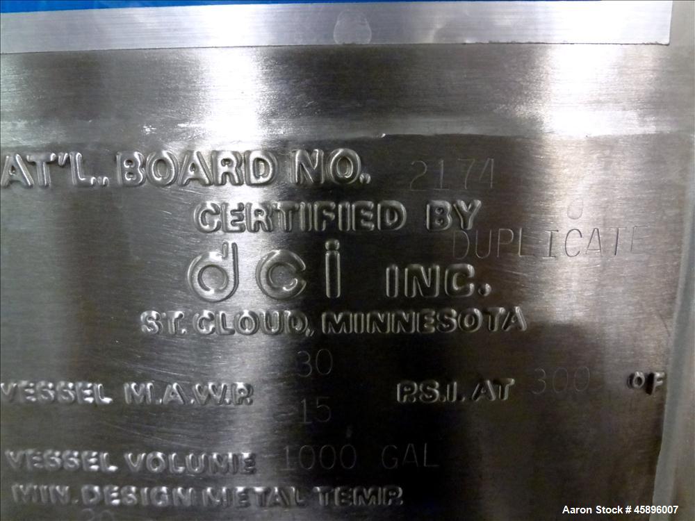 Used DCI Pressure Tank, 1000 Gallon, 316L Stainless Steel, Vertical. 76" Diameter x 52" straight side, dished top and bottom. 180 Grit finished internal rated 30/-15 psi at -20 to 300 degrees F. Insu...
