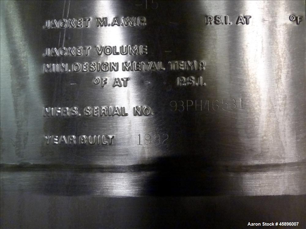 Used DCI Pressure Tank, 1000 Gallon, 316L Stainless Steel, Vertical. 76" Diameter x 52" straight side, dished top and bottom. 180 Grit finished internal rated 30/-15 psi at -20 to 300 degrees F. Insu...