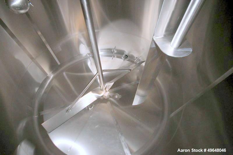 Used DCI 2,000 Gallon Stainless Steel Single Wall Mix Tank, Vertical. Dome Top/Cone Bottom. Top mounted agitation with bottom sweep blade and motor. Top entering baffle. Dual CIP Spray Ball. Mounted ...
