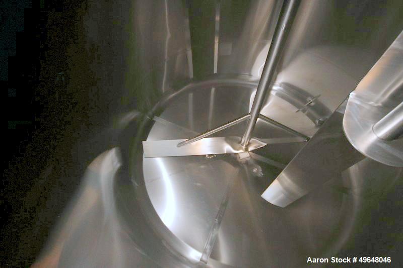 Used DCI 2,000 Gallon Stainless Steel Single Wall Mix Tank, Vertical. Dome Top/Cone Bottom. Top mounted agitation with bottom sweep blade and motor. Top entering baffle. Dual CIP Spray Ball. Mounted ...