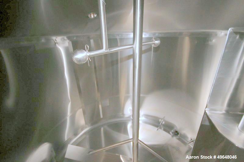 Used DCI 2,000 Gallon Stainless Steel Single Wall Mix Tank, Vertical. Dome Top/Cone Bottom. Top mounted agitation with bottom sweep blade and motor. Top entering baffle. Dual CIP Spray Ball. Mounted ...