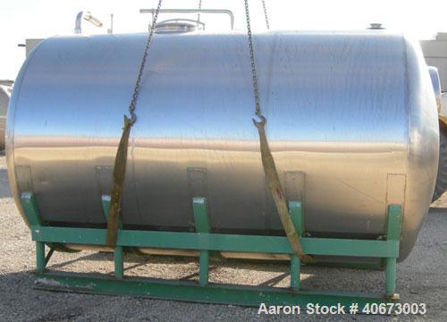 Used Delaval tank, 4,803 gallon (4000 Imperial), 304 stainless steel, horizontal.  Approximately 95" diameter x 144" straight side, dished heads.  2 Internal CIP spray balls.  Top Openings:  18" manw...