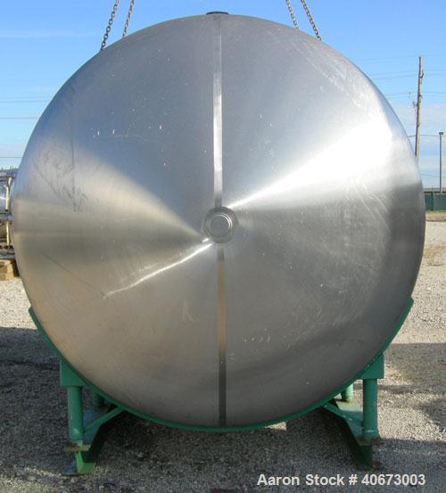 Used Delaval tank, 4,803 gallon (4000 Imperial), 304 stainless steel, horizontal.  Approximately 95" diameter x 144" straight side, dished heads.  2 Internal CIP spray balls.  Top Openings:  18" manw...
