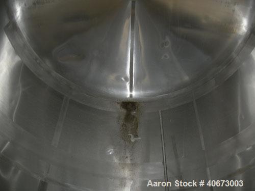 Used Delaval tank, 4,803 gallon (4000 Imperial), 304 stainless steel, horizontal.  Approximately 95" diameter x 144" straight side, dished heads.  2 Internal CIP spray balls.  Top Openings:  18" manw...