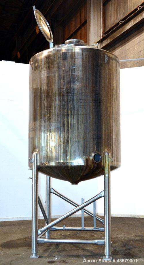 Used Feldmeier Tank, 1,500 Gallon, 316 Stainless Steel, Vertical. 72" Diameter x 78-1/2" straight side, dished top and bottom. (4) Side wall baffles. Openings top 2" tri-clamp, (3) 3" tri-clamp, 4" t...