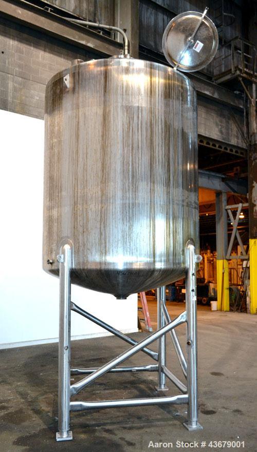 Used Feldmeier Tank, 1,500 Gallon, 316 Stainless Steel, Vertical. 72" Diameter x 78-1/2" straight side, dished top and bottom. (4) Side wall baffles. Openings top 2" tri-clamp, (3) 3" tri-clamp, 4" t...
