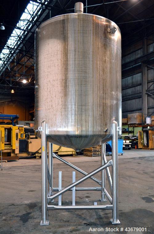 Used Feldmeier Tank, 1,500 Gallon, 316 Stainless Steel, Vertical. 72" Diameter x 78-1/2" straight side, dished top and bottom. (4) Side wall baffles. Openings top 2" tri-clamp, (3) 3" tri-clamp, 4" t...