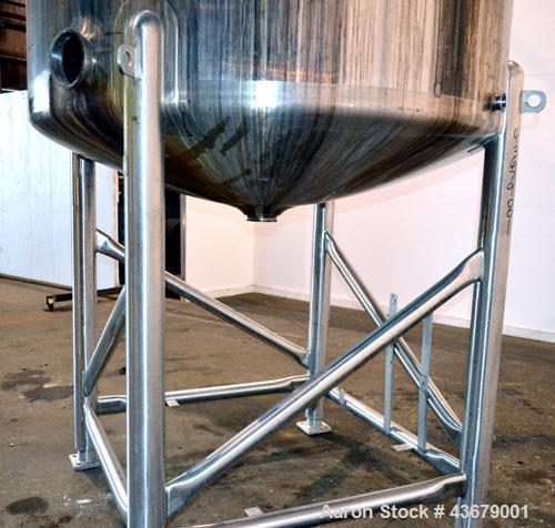Used Feldmeier Tank, 1,500 Gallon, 316 Stainless Steel, Vertical. 72" Diameter x 78-1/2" straight side, dished top and bottom. (4) Side wall baffles. Openings top 2" tri-clamp, (3) 3" tri-clamp, 4" t...