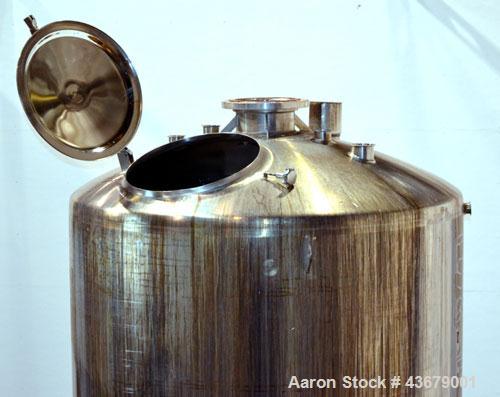Used Feldmeier Tank, 1,500 Gallon, 316 Stainless Steel, Vertical. 72" Diameter x 78-1/2" straight side, dished top and bottom. (4) Side wall baffles. Openings top 2" tri-clamp, (3) 3" tri-clamp, 4" t...
