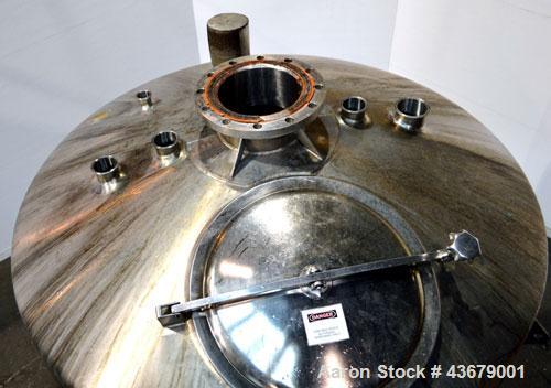 Used Feldmeier Tank, 1,500 Gallon, 316 Stainless Steel, Vertical. 72" Diameter x 78-1/2" straight side, dished top and bottom. (4) Side wall baffles. Openings top 2" tri-clamp, (3) 3" tri-clamp, 4" t...