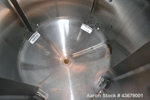 Used Feldmeier Tank, 1,500 Gallon, 316 Stainless Steel, Vertical. 72" Diameter x 78-1/2" straight side, dished top and bottom. (4) Side wall baffles. Openings top 2" tri-clamp, (3) 3" tri-clamp, 4" t...